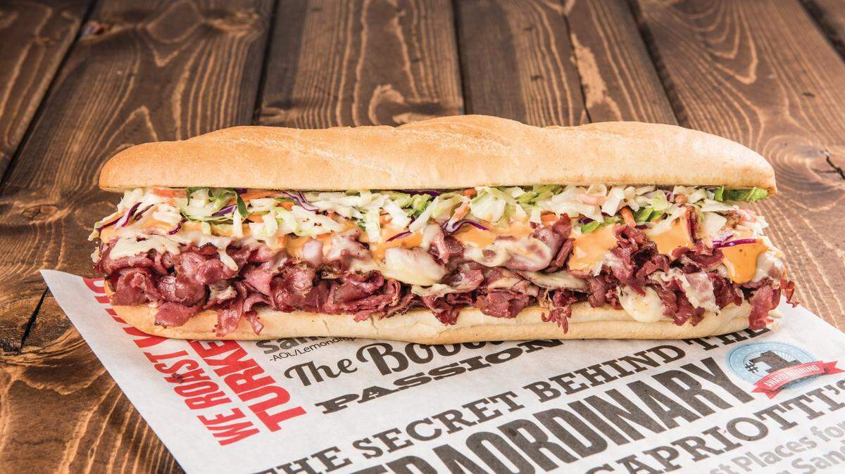 The Capastrami sandwich at Capriotti’s Sandwich Shop features hot pastrami, Swiss cheese, Russian dressing and coleslaw. The restaurant is planning three more locations in the area.