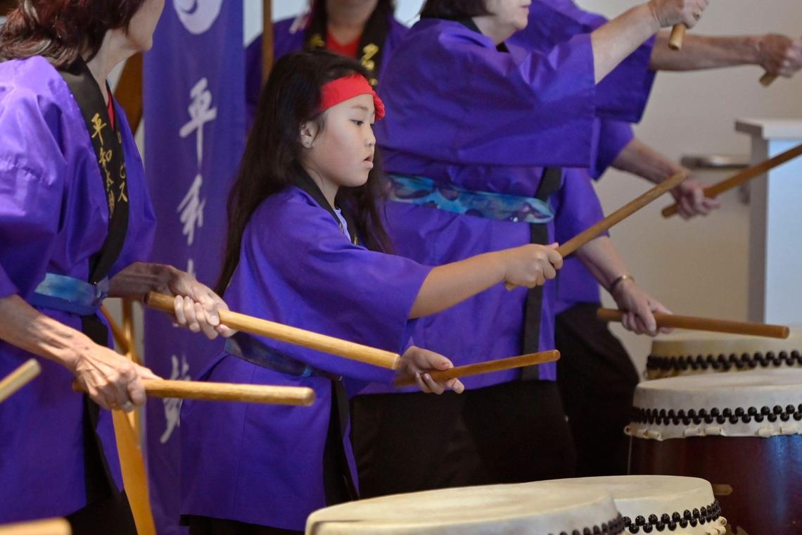 Madison Ansay, 8, jins in with the Clovis Heiwa Taiko drumming as hundreds gathered for a ribbon-cutting ceremony held for Clovis Unified’s newest school Hirayama Elementary Wednesday morning, Aug. 14, 2024 in Fresno.