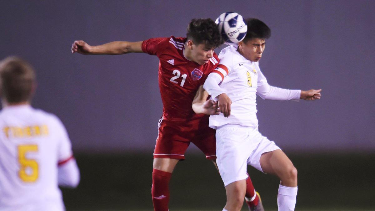 In FILE photo, Sanger’s Gabriel Torres, left, and Edison’s Isaak Lopez, right, in Central Section boys soccer Division II quarterfinal Thursday, Feb. 13, 2020 in Sanger.
