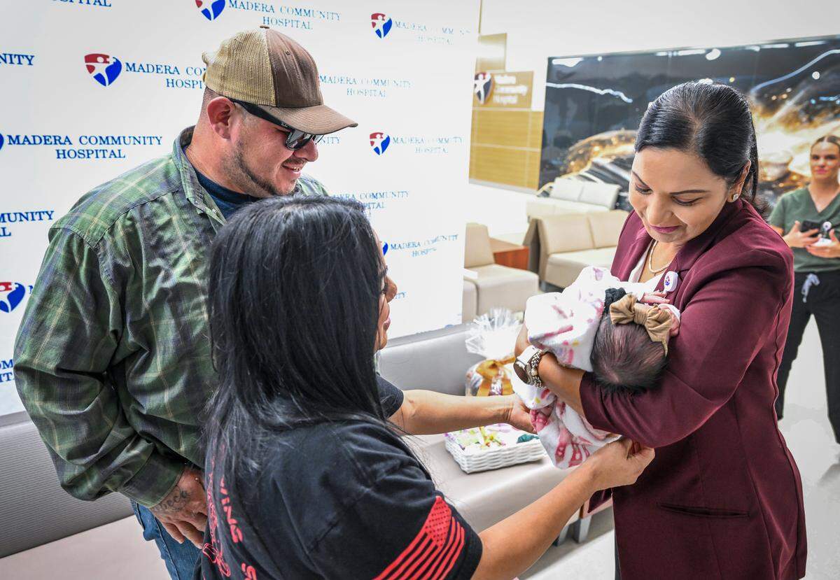 Rebeca Cervantes and her husband Javier Bautista let Madera Community Hospital CEO Sony Sidhu, hold their baby, Haven Bautista Cervantes, who was delivered at Madera Community Hospital on September 8, 2025. The Madera couple said they would be unable to make it to Saint Agnes in Fresno in time so they rushed to the Madera hospital.