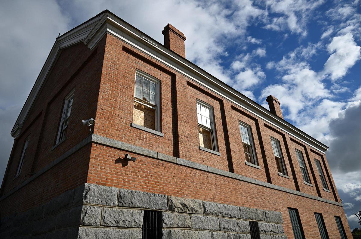 The Millerton Lake Courthouse, a replica of Fresno County’s original courthouse, seen at Millerton Lake Tuesday, Jan. 23, 2024 near Friant, CA. The front door is locked and windows are broken and boarded.
