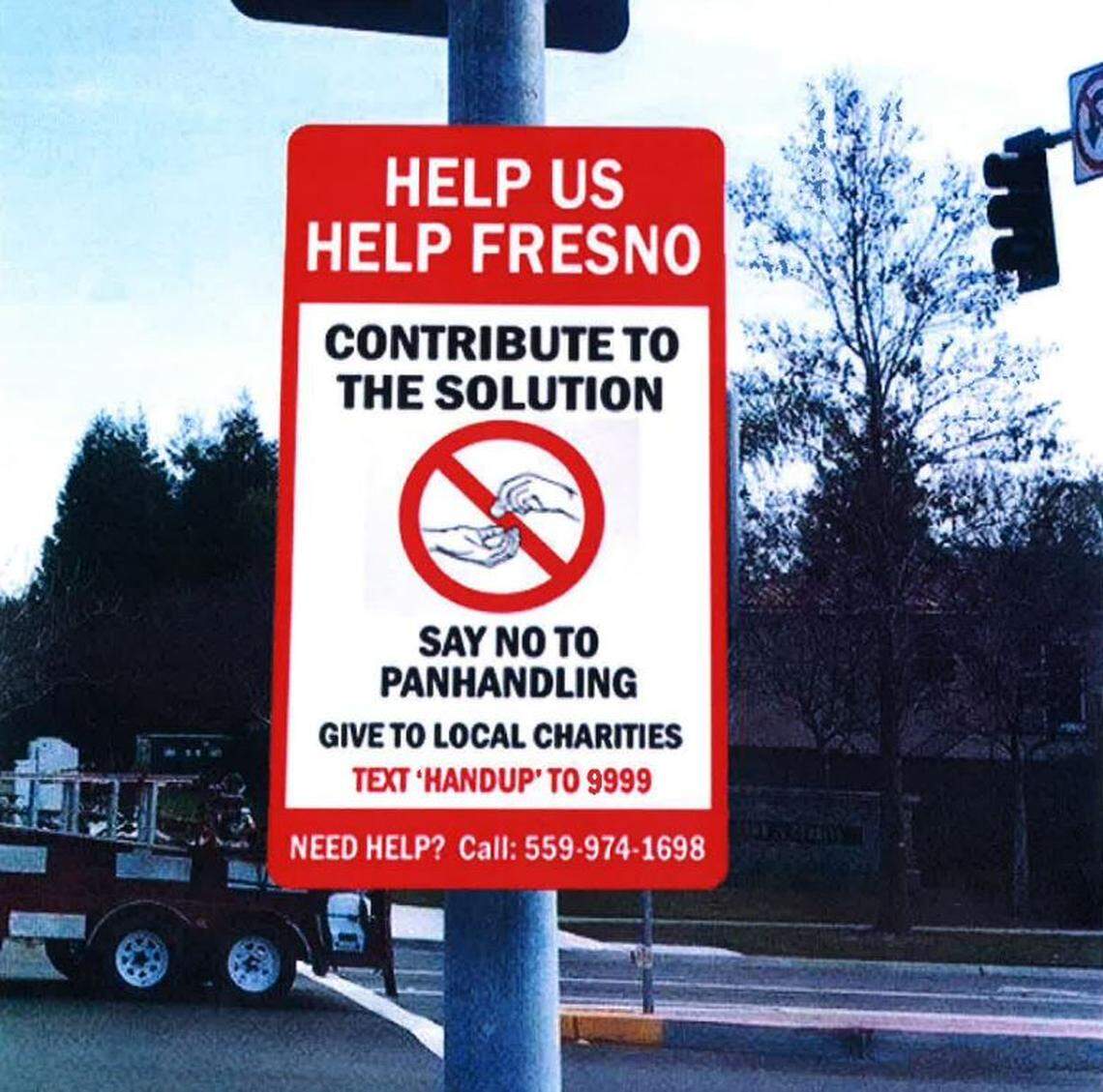 Three Fresno City Council members have proposed a resolution to put up signs in places where people frequently panhandle to encourage the public to give to charities instead.