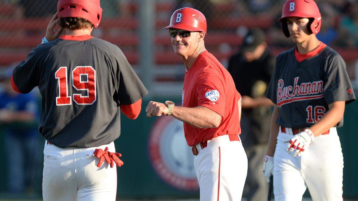 Buchanan High baseball coach Tom Donald, center, in a 2017 game.