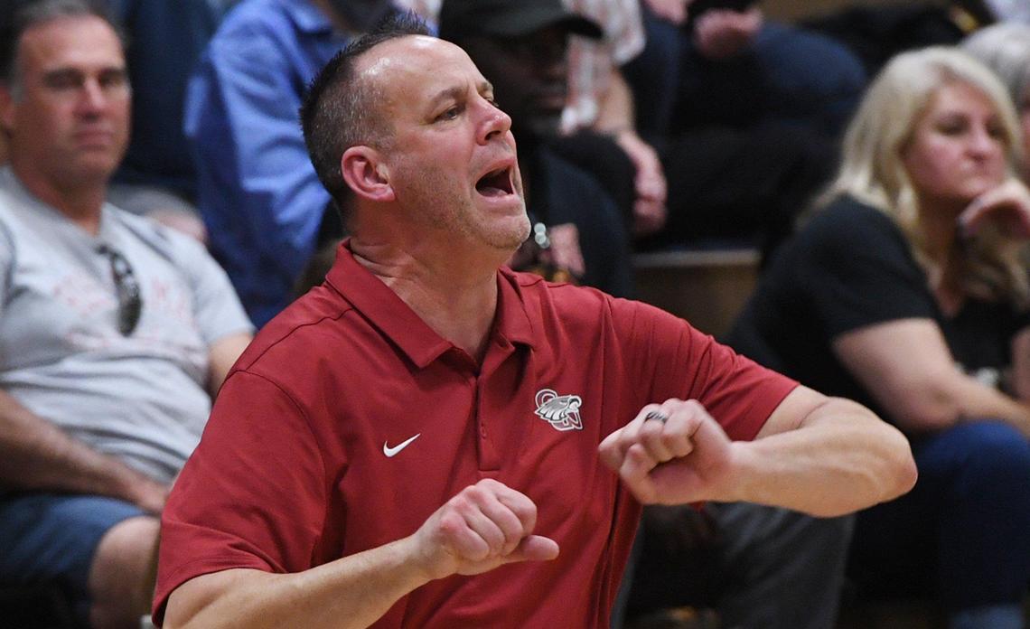 Clovis West head coach Craig Campbell directs from the sidelines against Nipomo in Open Division action Saturday, Feb. 19, 2022 in Fresno. Clovis West toppled Nipomo 68-18.
