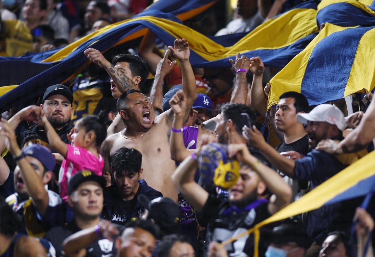 Pumas fans cheer their team against Chivas Wednesday, March 23, 2022 in Fresno.