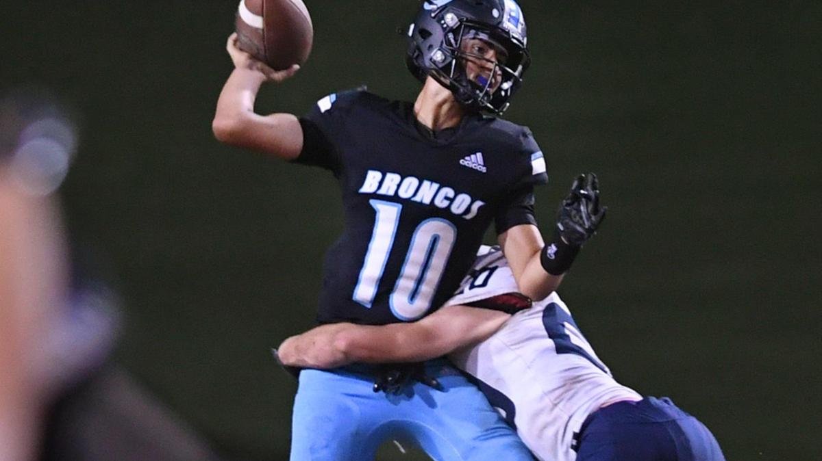 File photo of Clovis North QB Mario Cosma threw a touchdown pass on Friday, Oct. 8, 2022 in the Broncos’ 38-35 victory over Clovis.