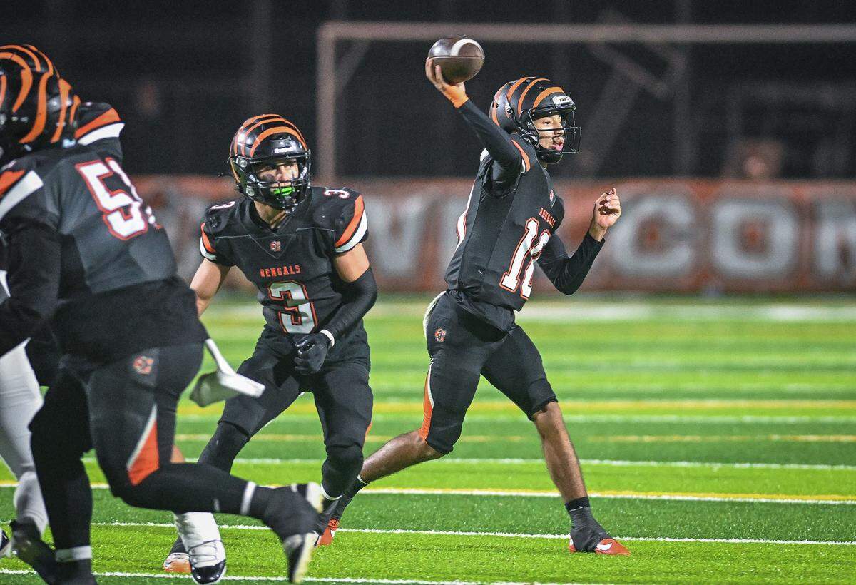Central East quarterback Jelani Dippel throws against Clovis during their Central Section Division I-AA championship game at Deran Koligian Stadium on Friday, Nov. 21, 2025.