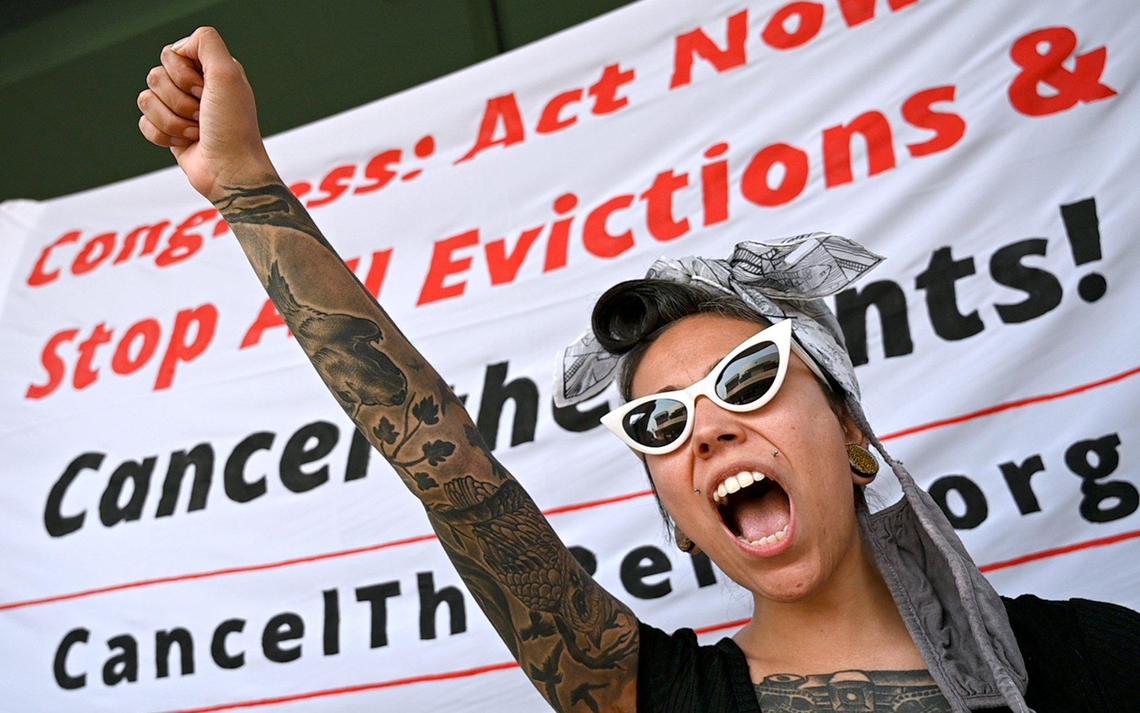 Lethal Garcia of Fresno joins in a chant during the Stop All Evictions! protest Saturday Sept. 25, 2021, in front of Rep. Jim Costa’s office.