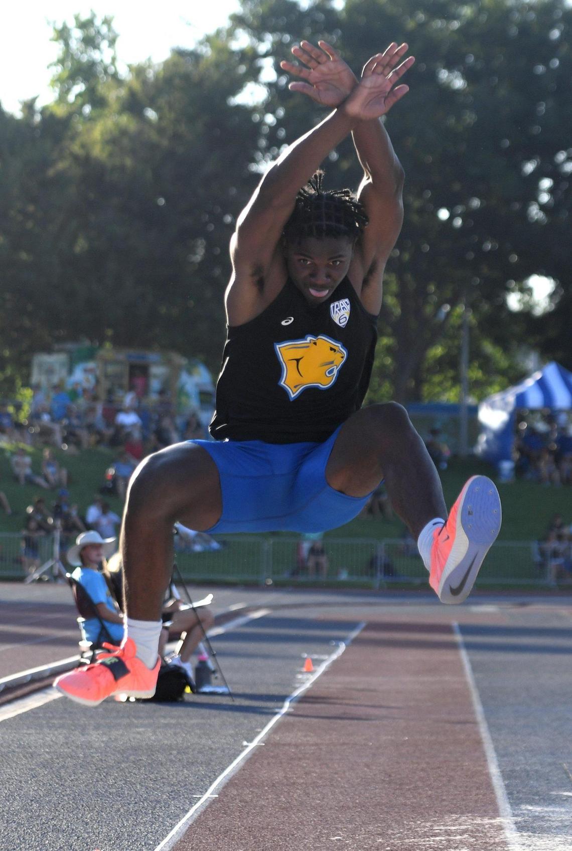 Clovis High’s Nathan Johnson competes in the long jump during the CIF Central Section Masters Track and Field 2021 Championships at Buchanan High, Saturday June 19, 2021.
