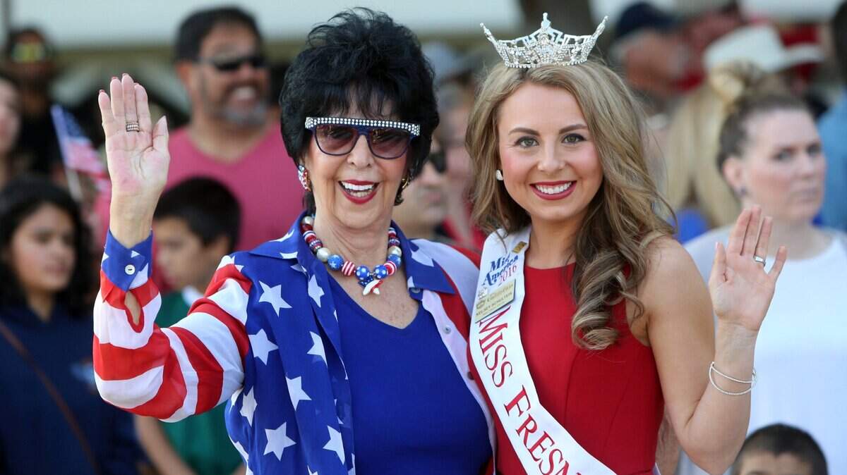 Miss Fresno County Pageant director Marie Theurich and Miss Fresno County Kelsey Schulteis get ready for the 97th annual Fresno Veterans Day Parade in 2016. Theurich died last week at age 86.