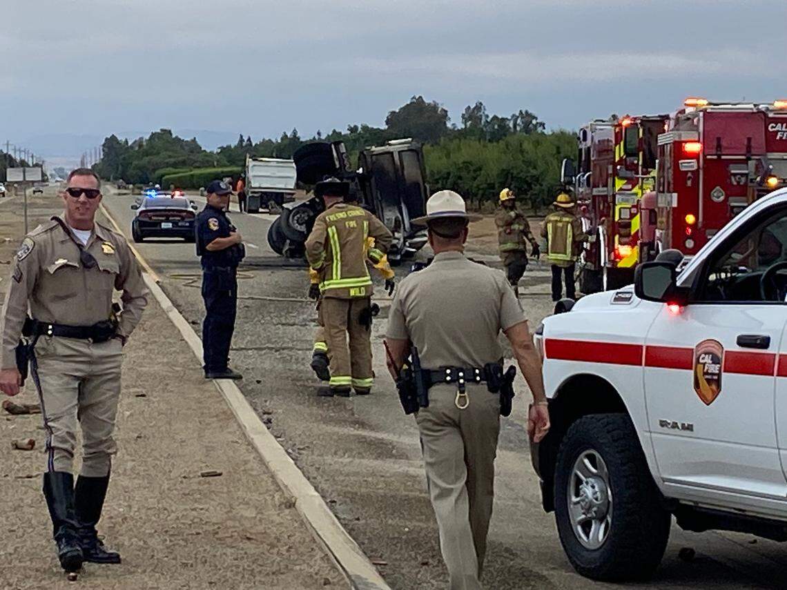 First responders survey a fatal crash on Academy Avenue near Shields Avenue on Wednesday, June 7, 2023, in Fresno County, according to the California Highway Patrol. 