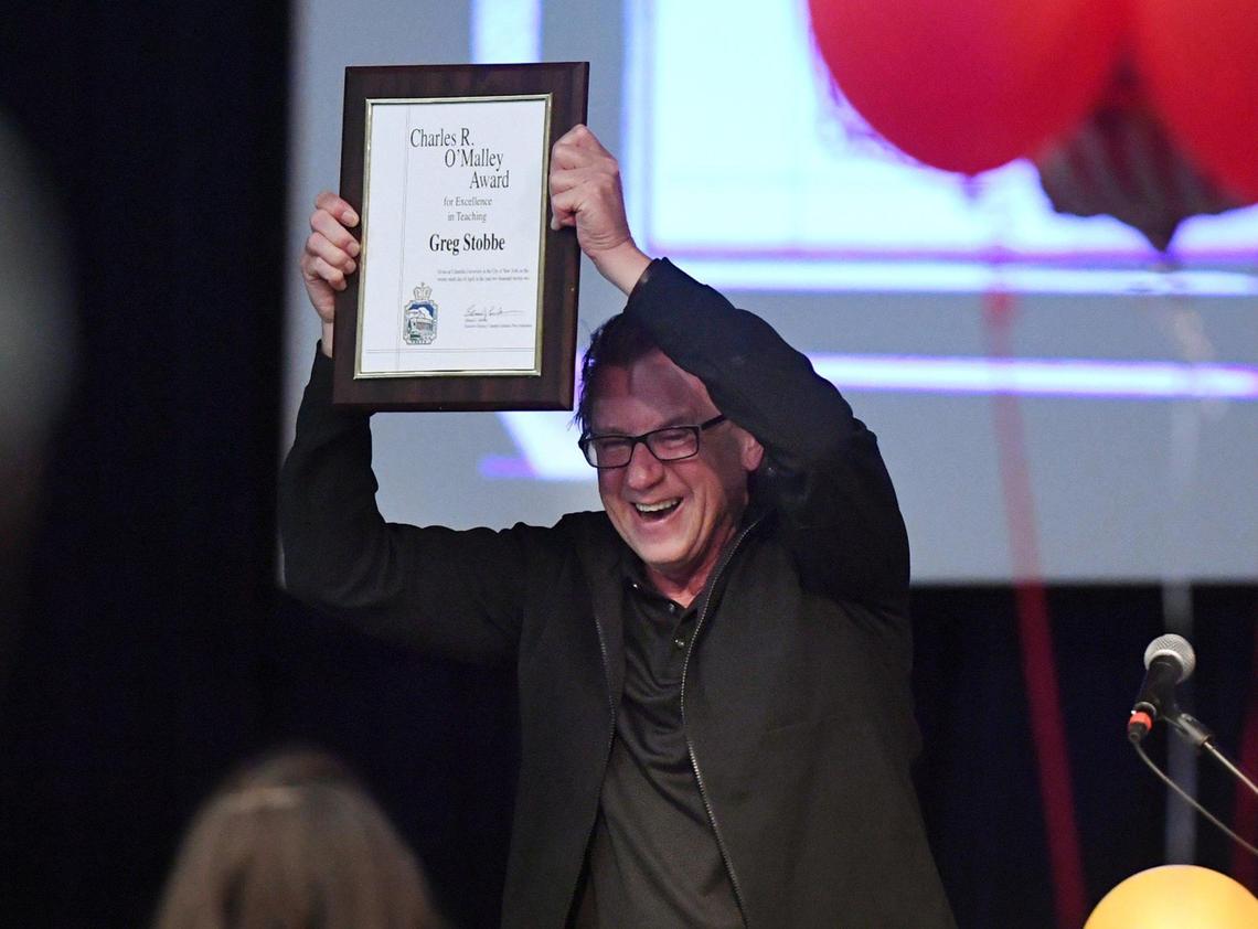 Fresno Christian journalism adviser Greg Stobbe was honored with the Columbia Scholastic Press Association’s Charles R. O’Malley Award for excellence in teaching at a surprise party attended by former students, family, colleagues and friends Friday, April 29, 2022 in Fresno. As part of the over 2 hour program, students inspired by Stobbe in the past sent video messages of gratitude and appreciation, displayed on a large screen to about 100 attendees in the Student Ministry Center at Fresno Christian.