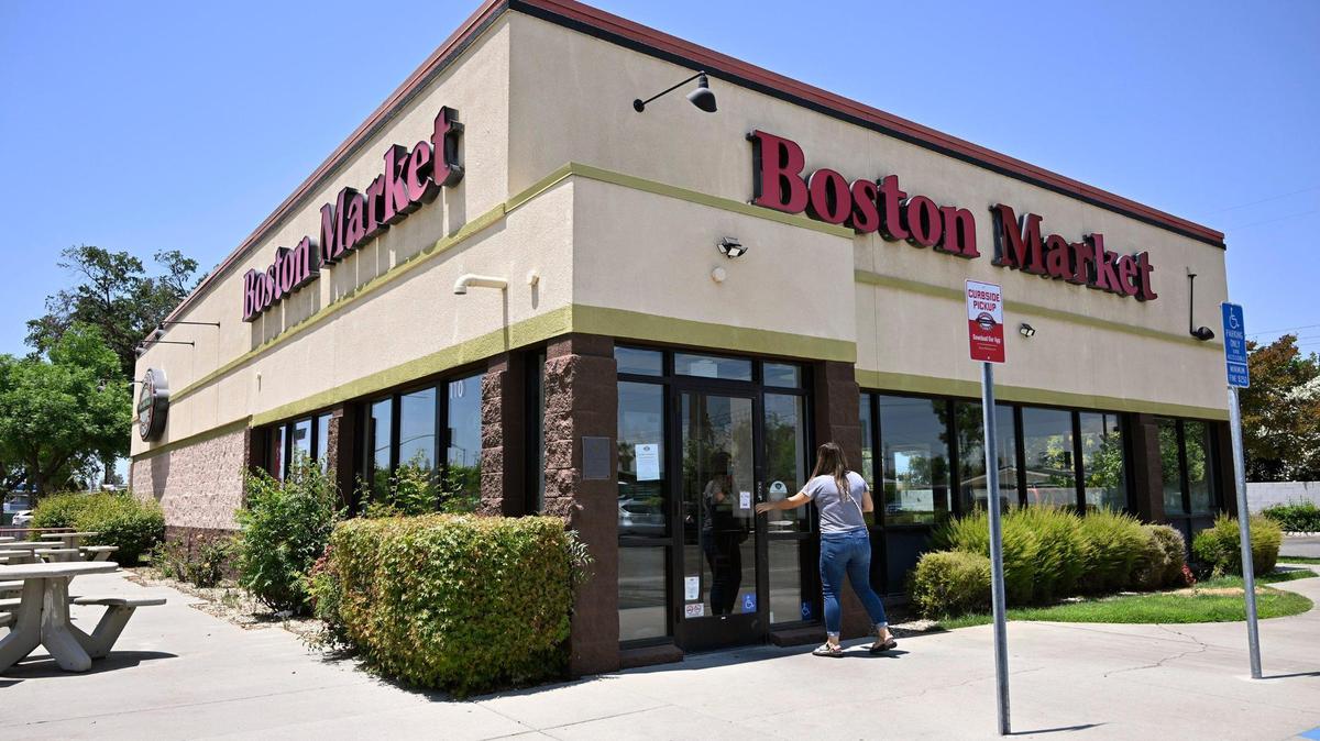 A customer finds the Boston Market on Bullard Avenue at Highway 41 is temporarily closed according to a sign on the door. Photographed Friday, June 16, 2023 in Fresno.