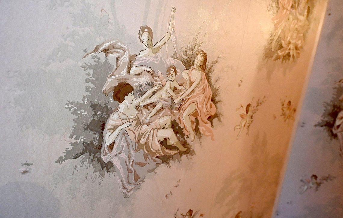 Detail of original wallpaper in one of seven bathrooms of the 1939 Huntington Boulevard mansion, now for sale. Larry and Penny Raven are owners of the historic home for 50 years.