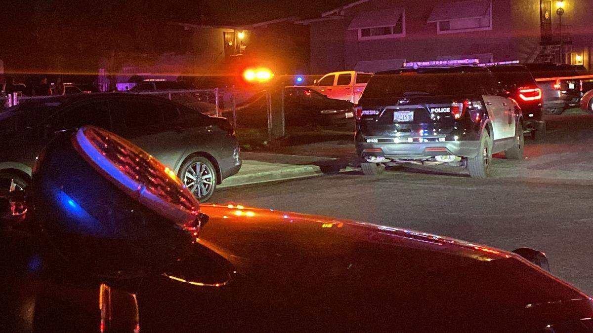 Fresno police at the scene of a shooting that killed one person and injured two others Sept. 10, 2024.