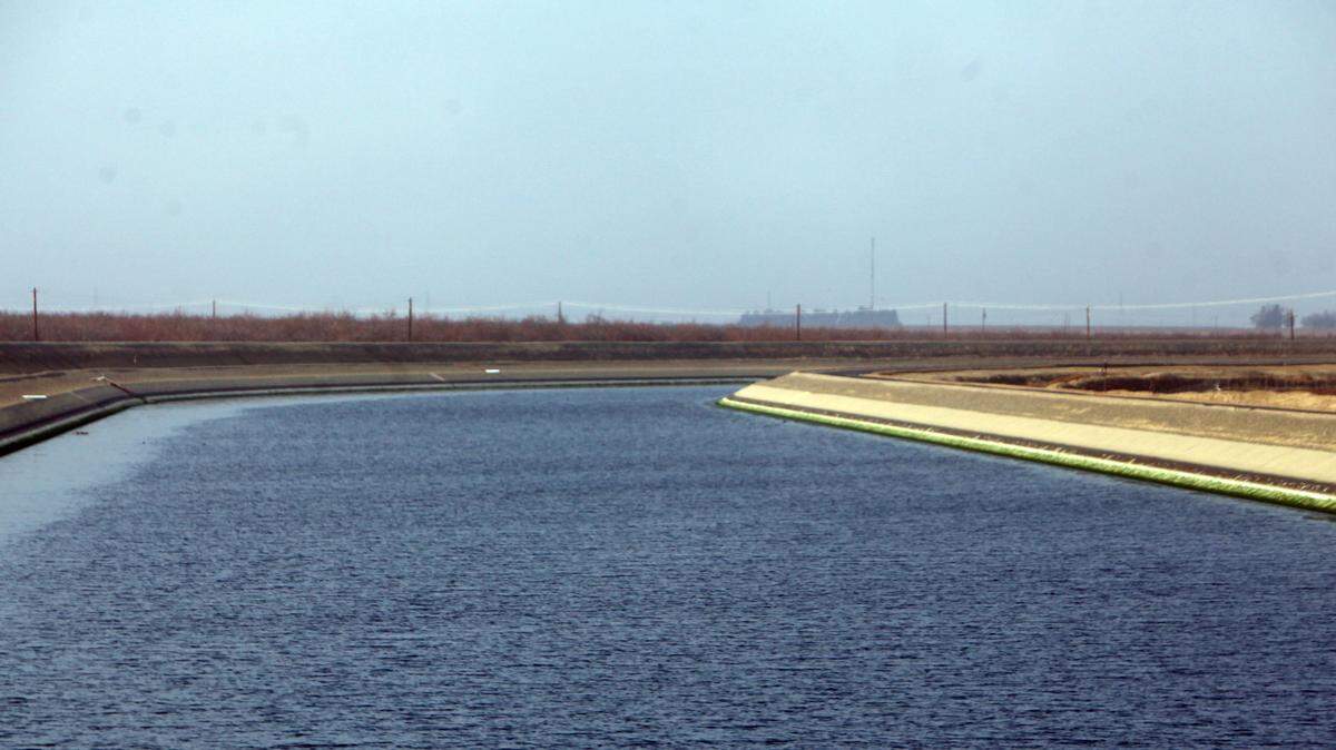 The California Aqueduct brings water from the Sacramento-San Joaquin Delta to farms and cities in the south state. The State Water Project will surrender some of its water to the federal Central Valley Project under a deal made by Gov. Jerry Brown.