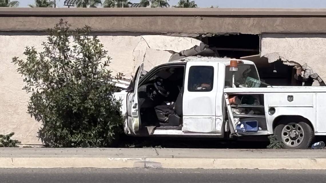 Driver hospitalized after crashing into Fresno storage facility, police say