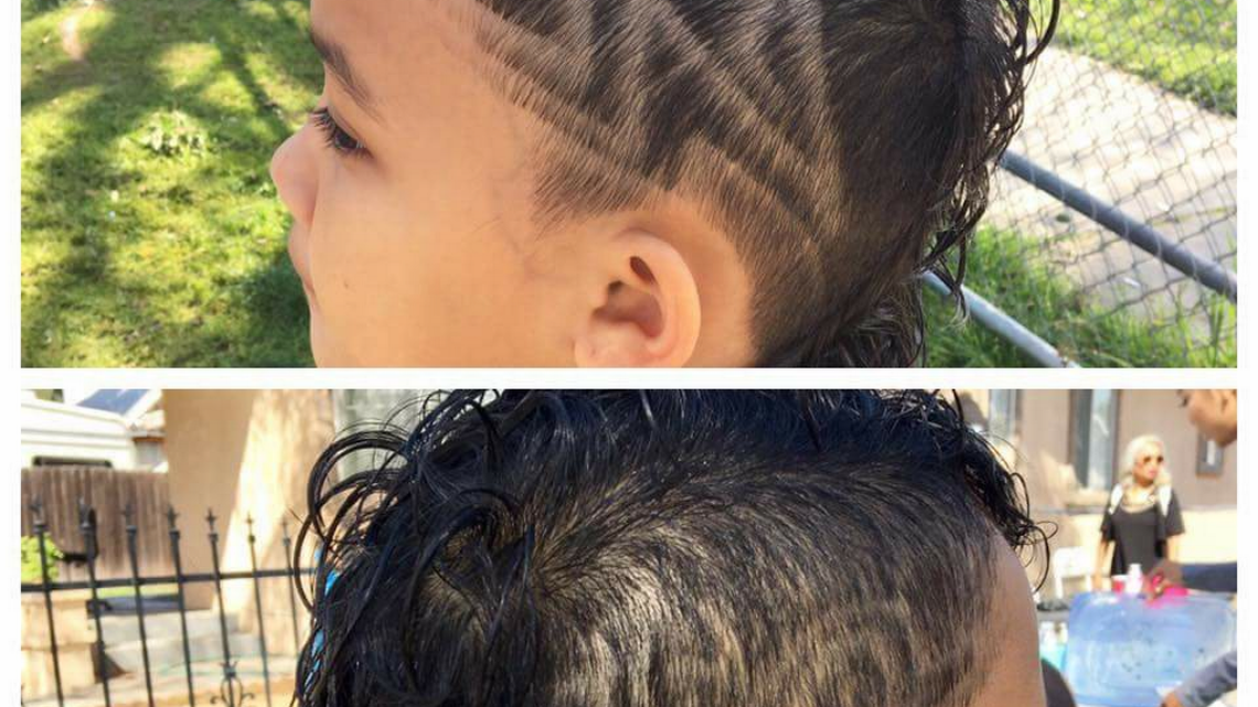 Layla Sysaknoi, an 8-year-old student in Fresno, was recently kept home due to her buzz cut that featured her initials on one side, and a design on the other. The third-grade student missed a week of school.
