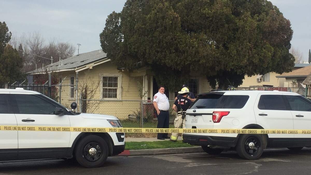 A dead body was found in an RV that burned behind this home near Orange and Lowe avenues in southeast Fresno, CA on Tuesday, Jan. 29, 2019.
