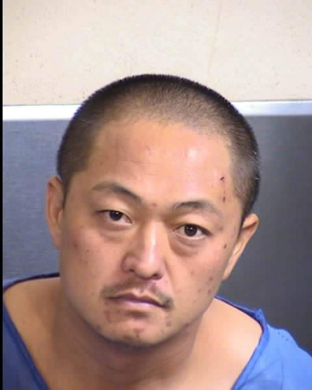 Thong Vang, 38, of Fresno, is accused of shooting and wounding two unarmed correctional officers in the lobby of the Fresno County Jail on Sept. 3, 2016.