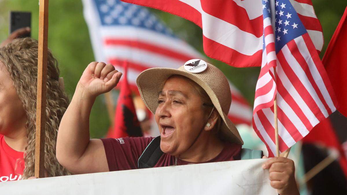 Georgina Salazar of Lamont joined about 200 immigration reform supporrters who marched through downtown streets during the May 1, 2023 Fresno May Day Immigration Reform rally/march.