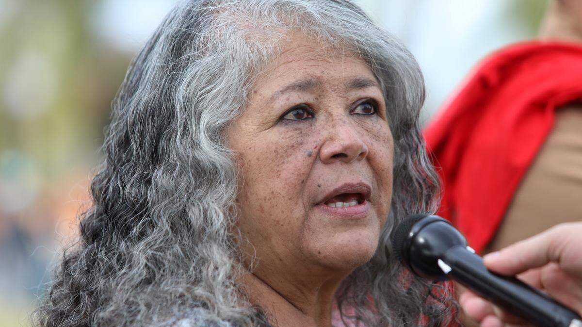 United Farm Workers President Teresa Romero gives an interview at Delano Memorial Park before an estimated 7,000 marched three miles to Forty Acres on what would have been UFW founder César E. Chávez’s 98th birthday on March 31, 2025. 