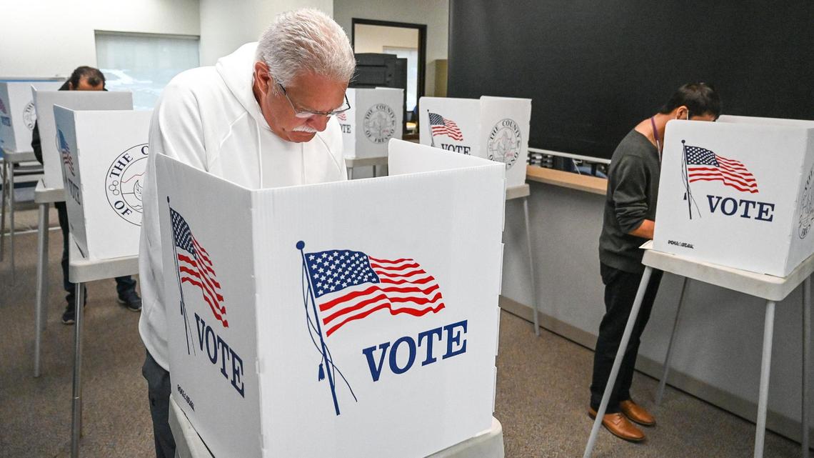 Mike Jones of Fresno fills out a ballotat the downtown Fresno elections office prior to Tuesday’s general election.