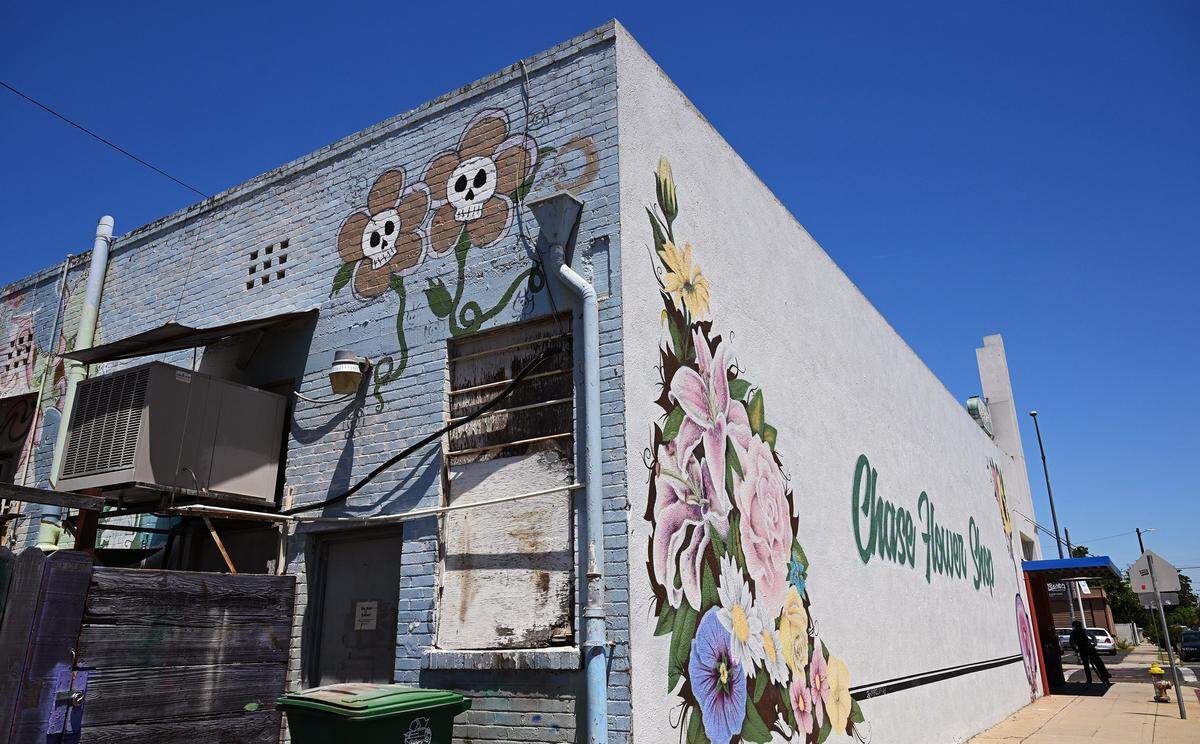 Murals seen at the rear corner of Chase Flower Shop, located on Van Ness Avenue in the Tower District. The business closed with a business closure sale last month. Photographed Wednesday, June 3, 2026 in Fresno.