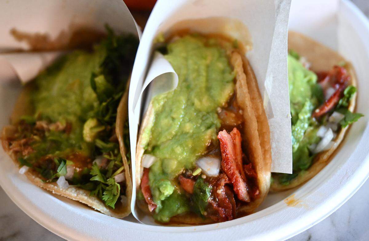 Two adobada tacos and one carnitas, left, are served at Frida’s Azul, a new restaurant opened at Herndon and Willow avenues in Clovis, Thursday, July 24, 2025.