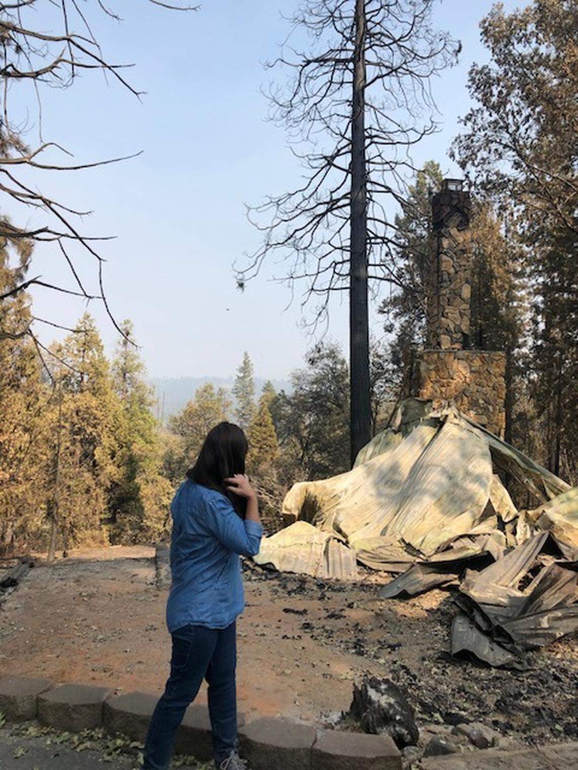 Susan Lea’s first view of what was left of her family’s Pine Ridge area cabin, which burned in the Creek Fire on Sept. 11th, 2020.