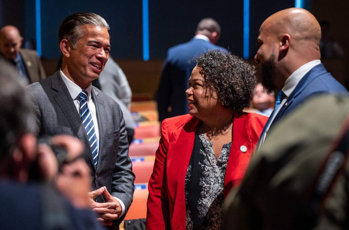 Attorney General of California Rob Bonta, left, and his wife, Mia Bonta, mingle with state lawmakers and staff before Gov. Gavin Newsom gives his 2022 State of the State Address at the California Natural Resources Agency Auditorium on Tuesday, March 8, 2022, in Sacramento.