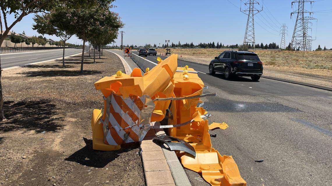 A piece of traffic equipment was destroyed on the first day of a new traffic pattern on eastbound Herndon Avenue between Hayes and Polk avenues in northwest Fresno on Aug. 7, 2023. Drivers on Herndon are being diverted onto a new portion of the Veterans Boulevard project. The old lanes of Herndon, now closed, will eventually be demolished.