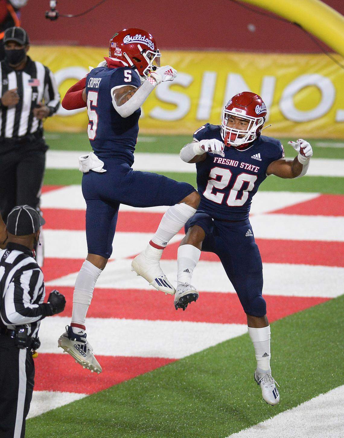 Fresno State running back Ronnie Rivers, right, celebrates with teammate Jalen Cropper after scoring a touchdown in a 38-17 victory over Colorado State at Bulldog Stadium on Thursday, Oct. 29, 2020.