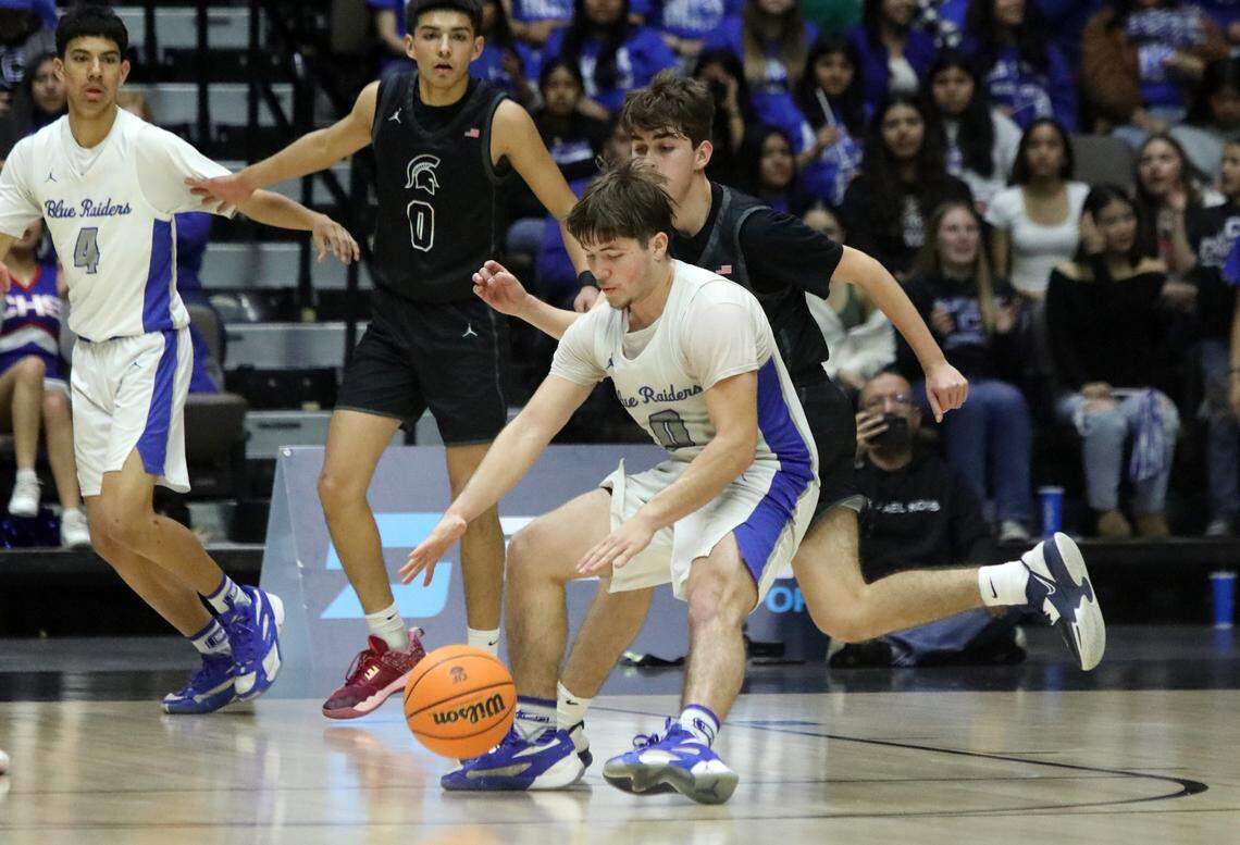 Caruthers High’s Josiah Cardoza tries his luck against the Strathmore High defense during the CIF Central Section Division VI championship game at Selland Arena on Feb. 23, 2024. Caruthers won, 37-28.