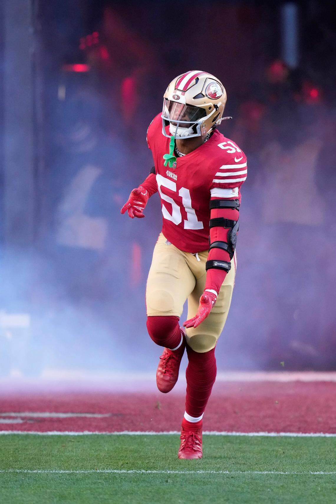 San Francisco 49ers linebacker Azeez Al-Shaair is introduced before an NFL divisional round playoff football game against the Dallas Cowboys in Santa Clara, Sunday, Jan. 22, 2023.
