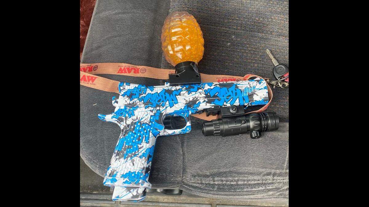A “gel blaster” toy gun confiscated by police after a driver shot at a man while using a racial slur in Clovis.