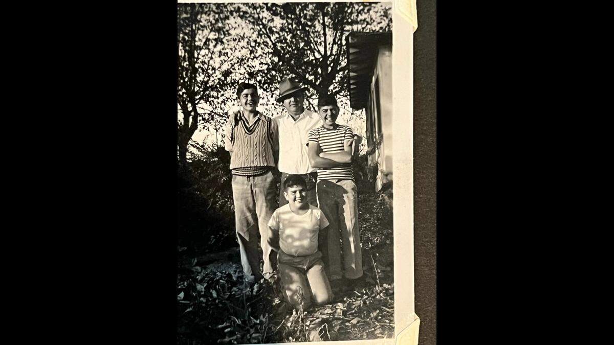 Kaspar Hovannisian and his sons on the family farm in Tulare.