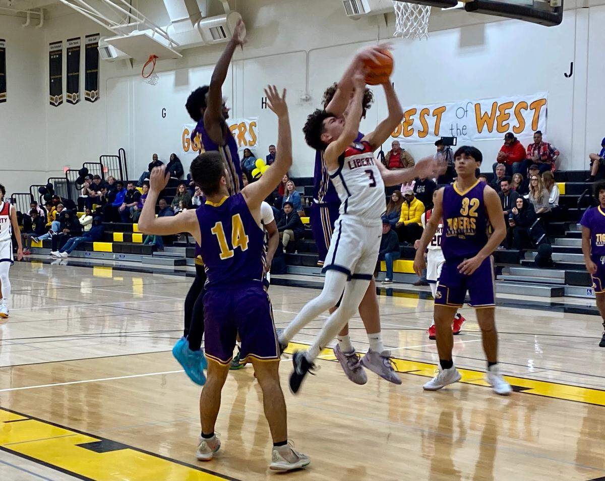 Lemoore’s Dom Fox goes for a block against Liberty-Bakersfield on Saturday, Jan. 14, 2023.
