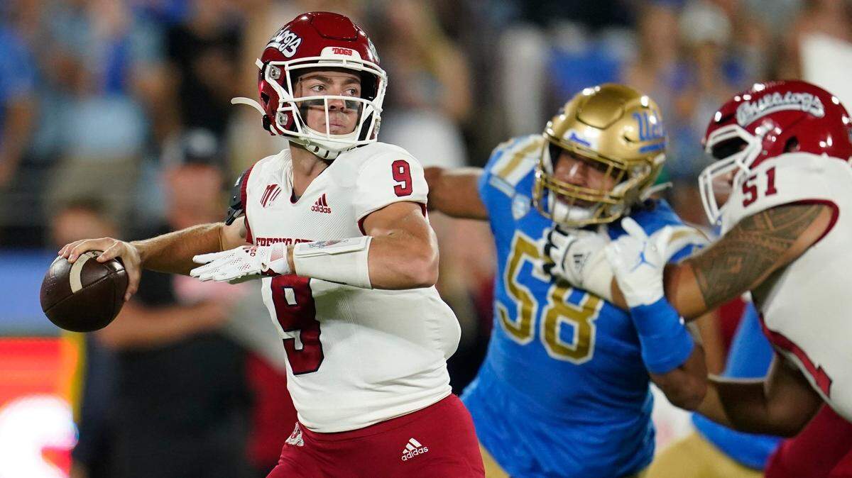 Fresno State quarterback Jake Haener looks for a receiver during the first half of the team’s NCAA college football game against UCLA on Saturday, Sept. 18, 2021, in Pasadena, Calif. (AP Photo/Marcio Jose Sanchez)