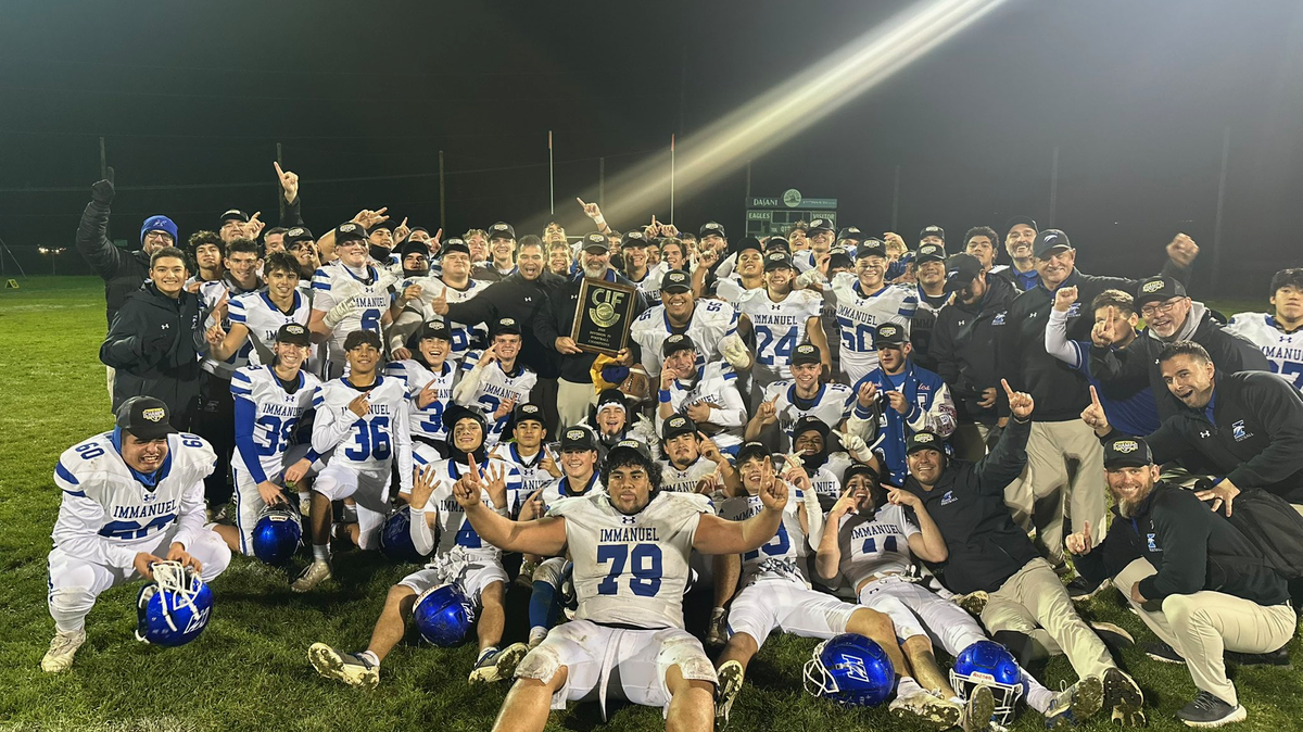 Immanuel High poses for a photo after winning the Central Section Division IV title on Friday, Nov. 28, 2025.