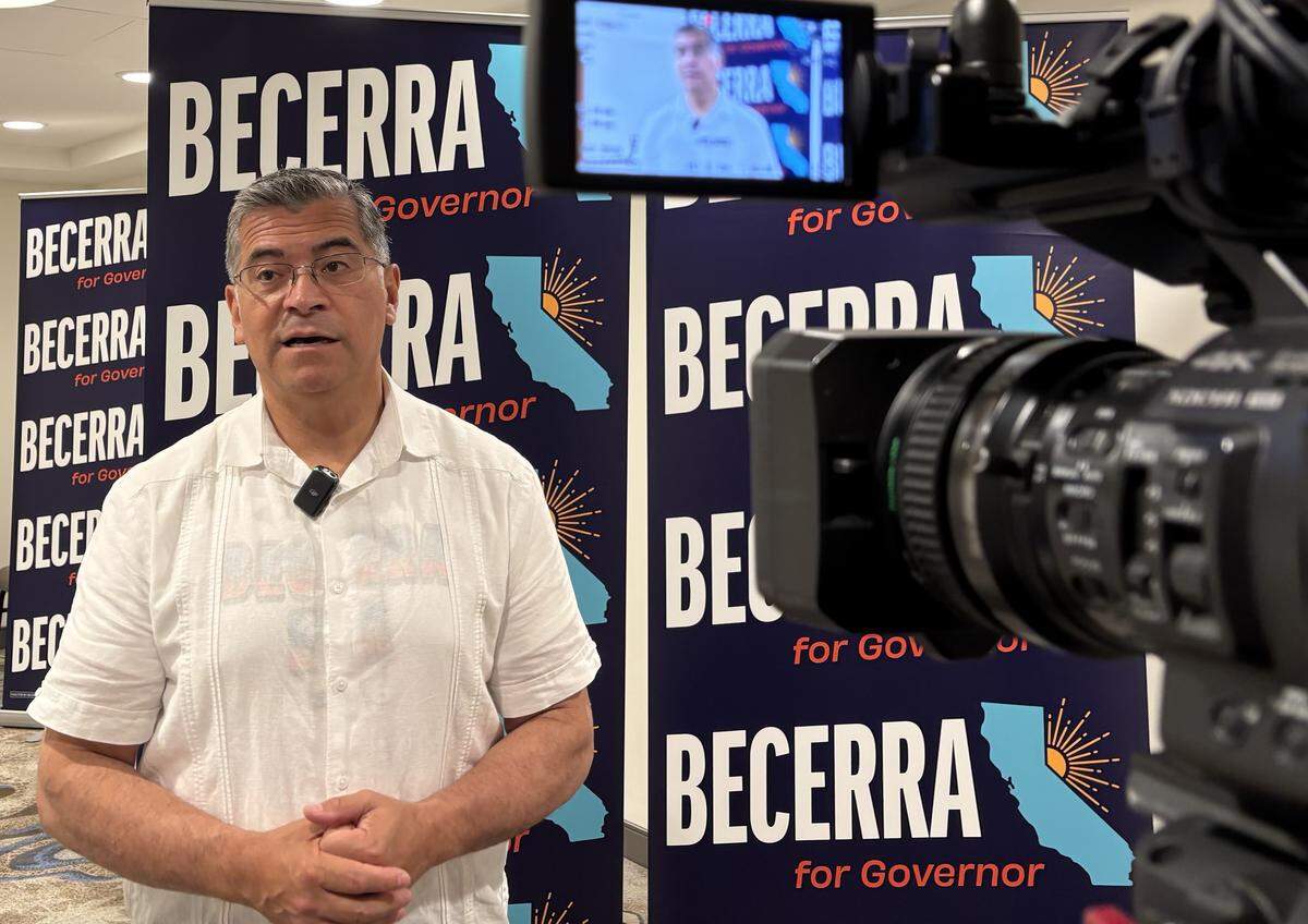 Xavier Becerra answers questions from reporters after a campaign rally at the Doubletree Hilton in downtown Fresno on Saturday May 23, 2026.