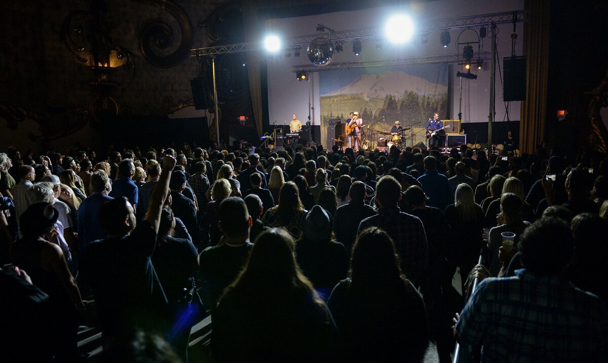 Members of the Sacramento band Cake peform during a benefit concert for the Andrew Janz campaign at the Crest Theater in downtown Fresno on Friday, Nov. 2, 2018.
