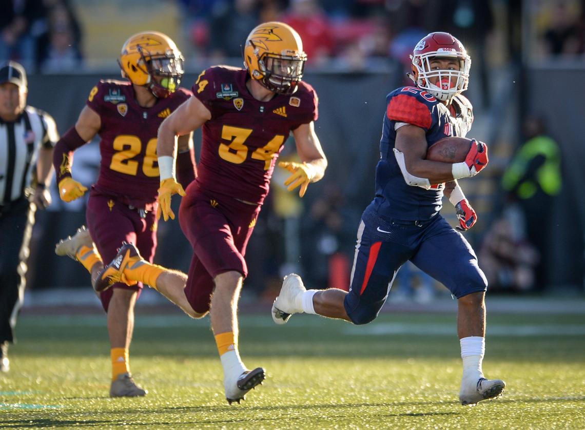 Fresno State’s Ronnie Rivers, right, breaks free for a 68-yard touchdown in the second half of the Bulldogs’ 31-20 victory over Arizona State at the Las Vegas Bowl at Sam Boyd Stadium in Las Vegas on Saturday, Dec. 15, 2018.