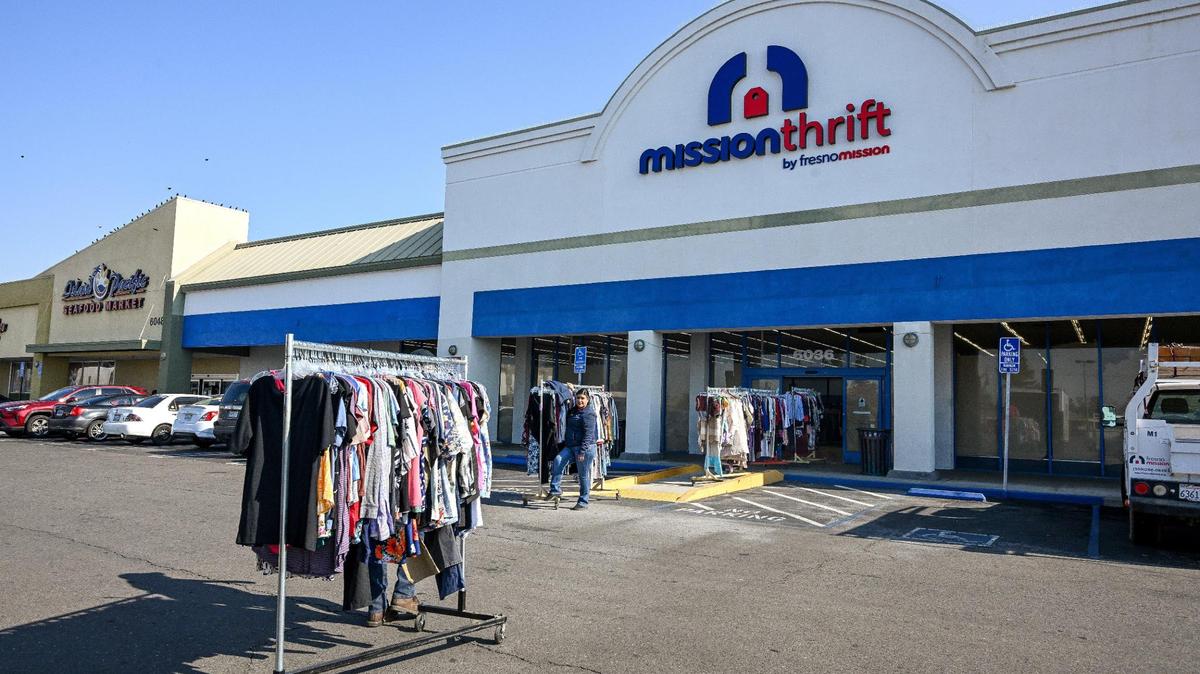 Workers prepare for the opening of Mission Thrift in the former 99 Cents Only store spot in the shopping center on the northeast corner of Bullard Avenue and First Street in Fresno.