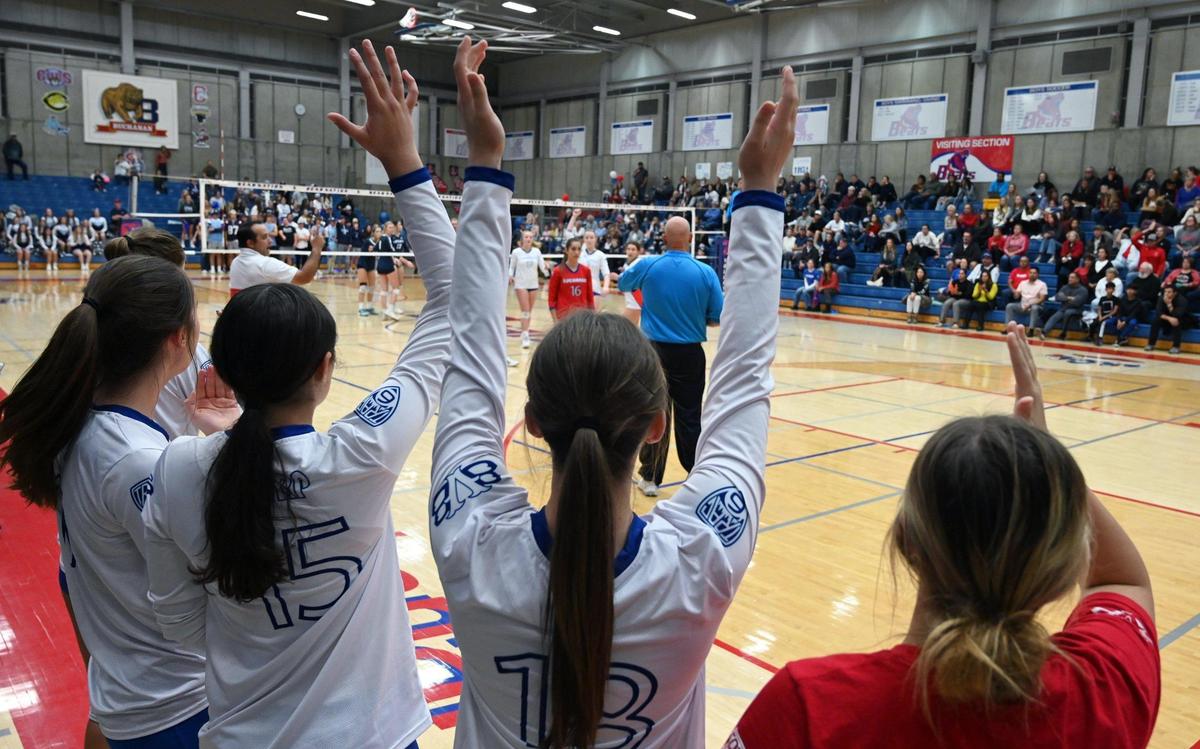 Buchanan’s sideline celebrates a point against Central Valley Christian in the Central Section’s Division II girls volleyball championship Thursday, Nov. 3, 2022 in Clovis.