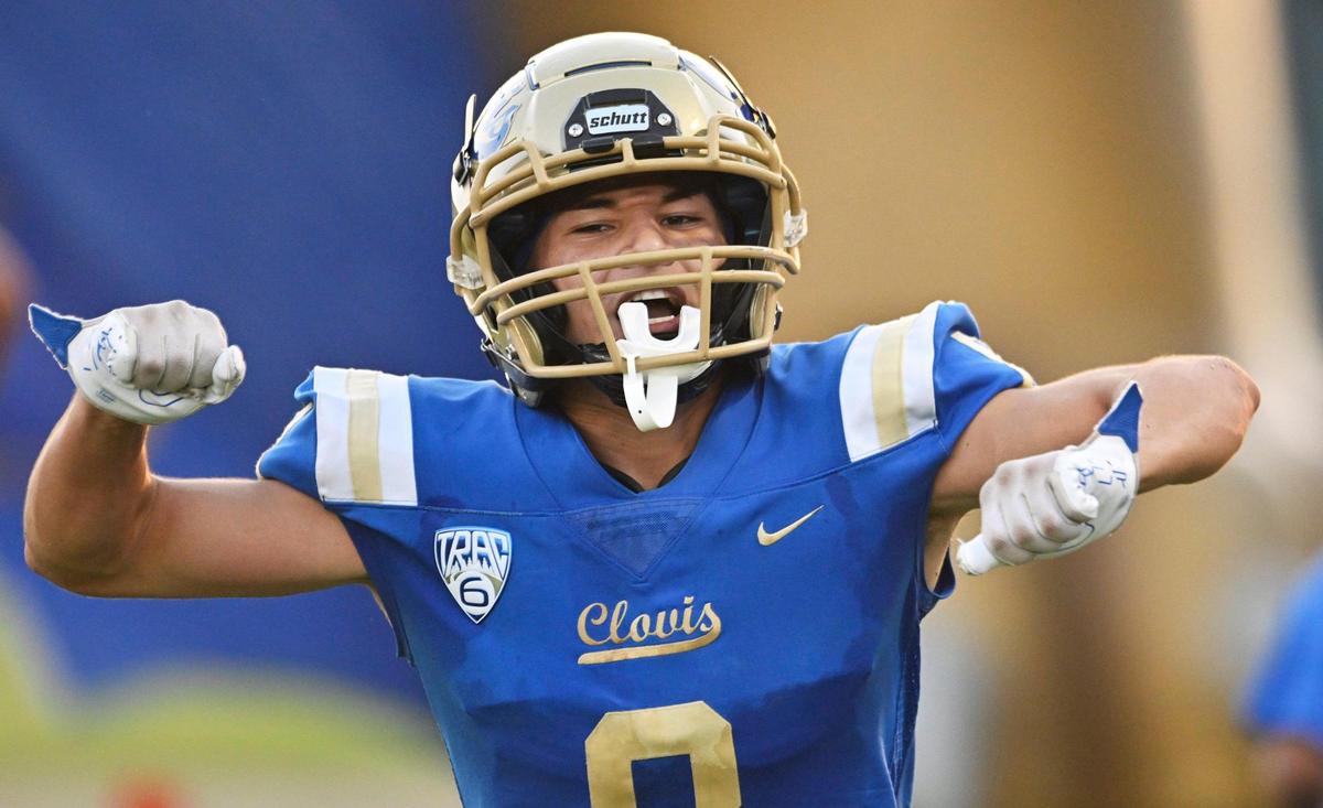 Clovis High’s Tyler Marquez celebrates his touchdown against Garces in the first game of the season Thursday, Aug. 17, 2023 in Clovis.