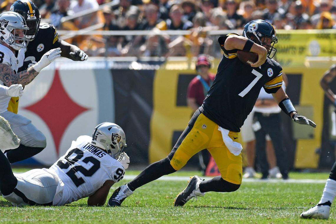 Pittsburgh Steelers quarterback Ben Roethlisberger is sacked by Las Vegas Raiders defensive end Solomon Thomas during the first half of an NFL football game Sunday, Sept. 19, 2021, in Pittsburgh.