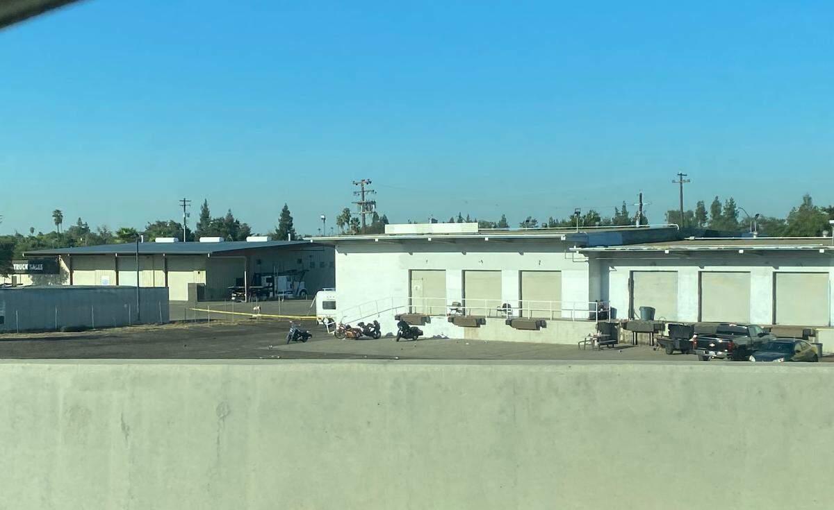 Police investigate a shooting that left one person dead and two with gunshot wounds, west of Highway 99 on Saturday, Oct. 1, 2022.