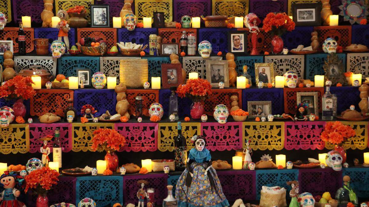 The Day of the Dead exhibit titled ‘La Añoranza/The Longing’ at Arte Américas features a large ofrenda (altar).