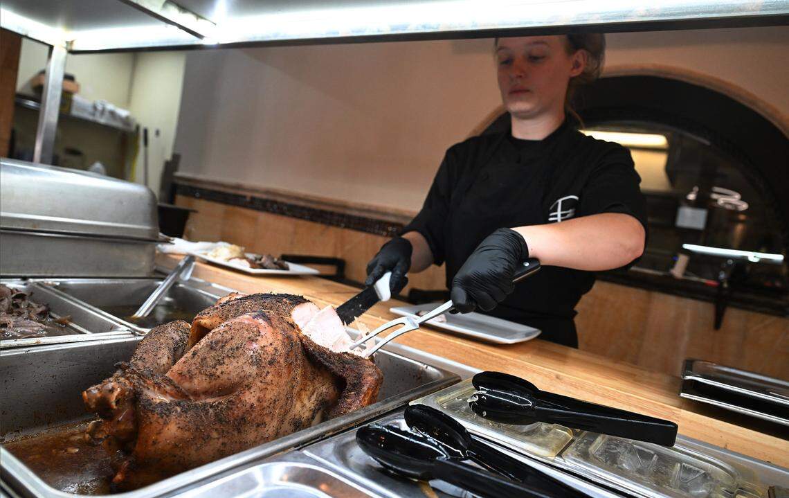 Turkey is carved for a customer at Dosan A Social Eatery, newly opened along Shaw Avenue between Villa and Minnewawa avenues. Dosan also offers a salad bar, buffet and a high end bar in Clovis.